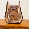 leather clock made out of stirrup