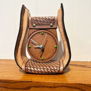 leather clock made out of stirrup